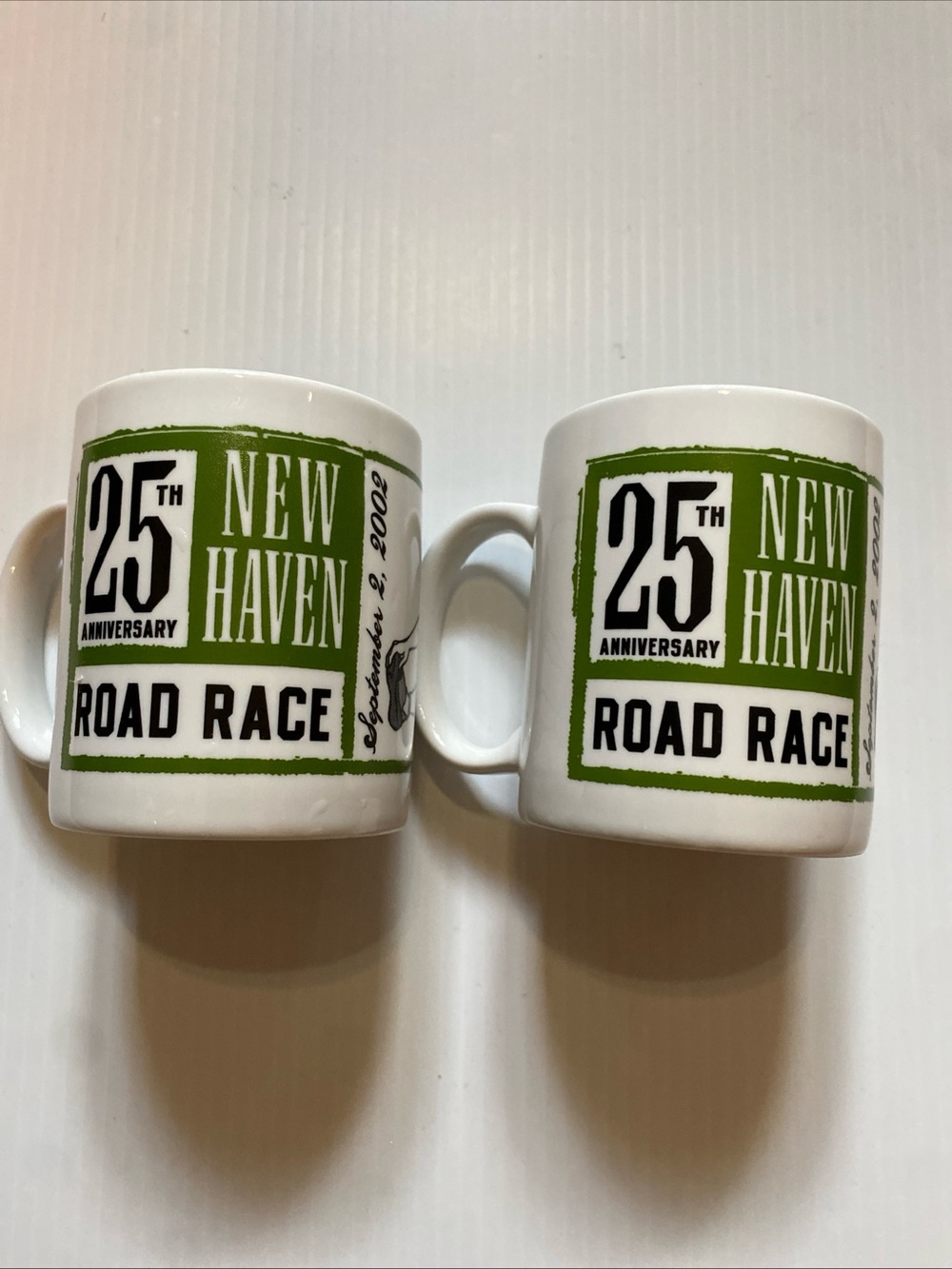 Two (2) New Haven Road Race 25th Anniversary Mugs Trudeau Doonesbury